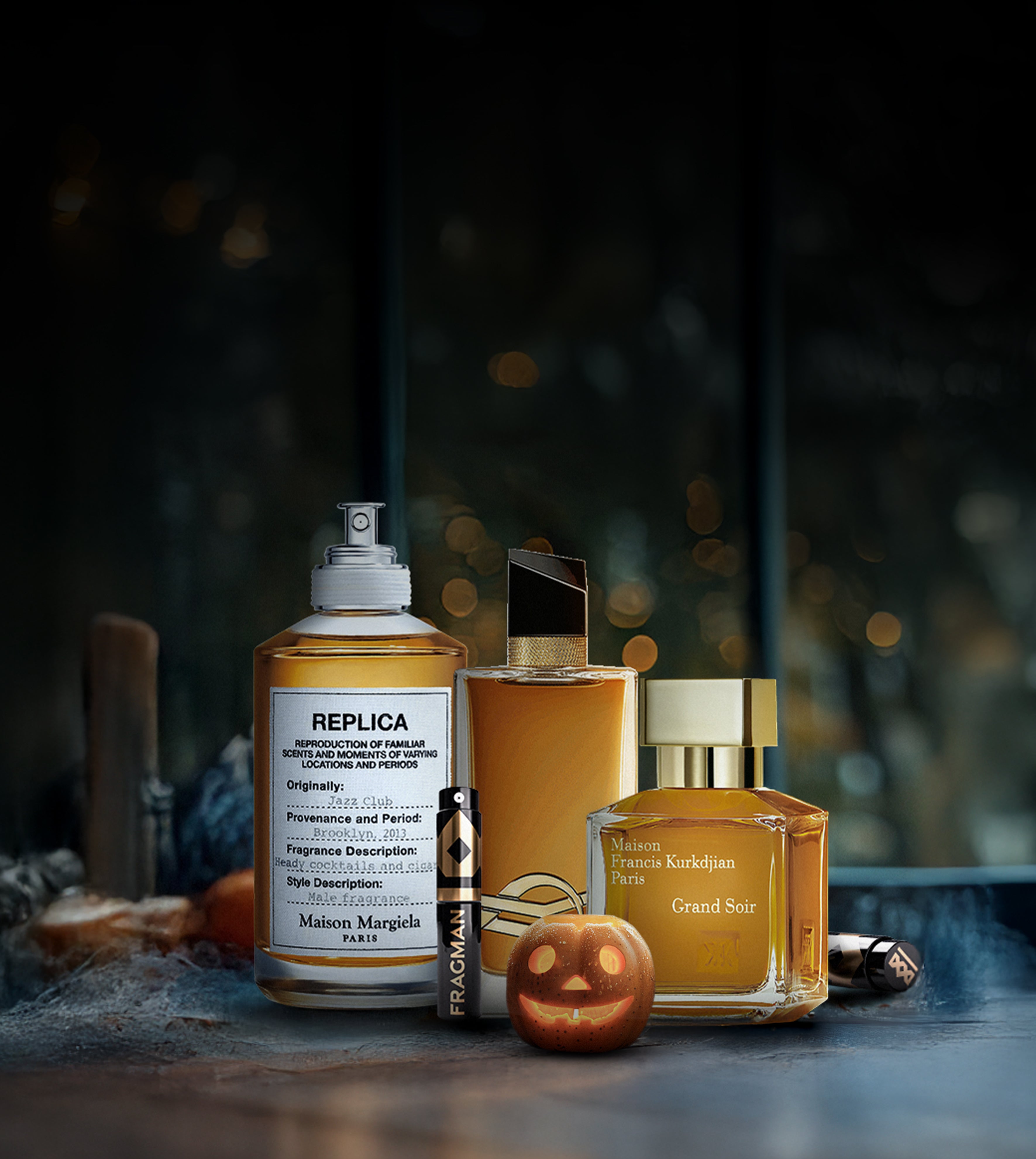 Background image featuring luxury fragrance bottles.