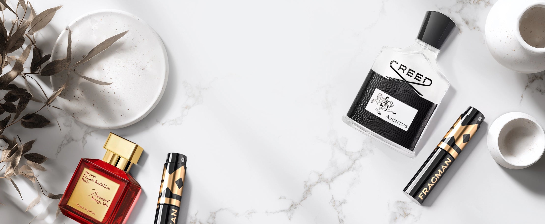 Background image featuring luxury fragrance bottles.